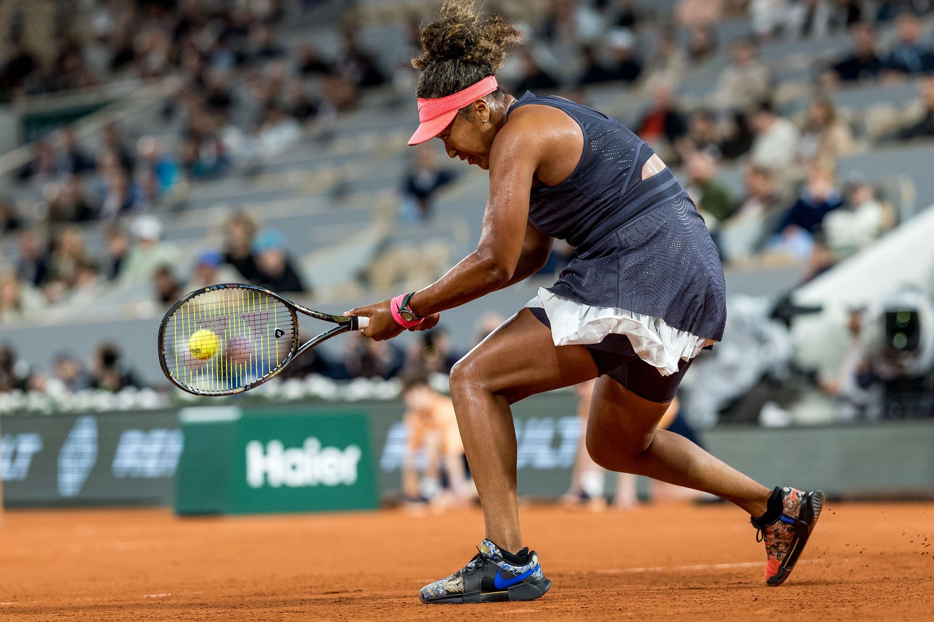 Naomi Osaka competes in her flowers and dragon-themed shoes at the 2024 French Open - Source: Getty